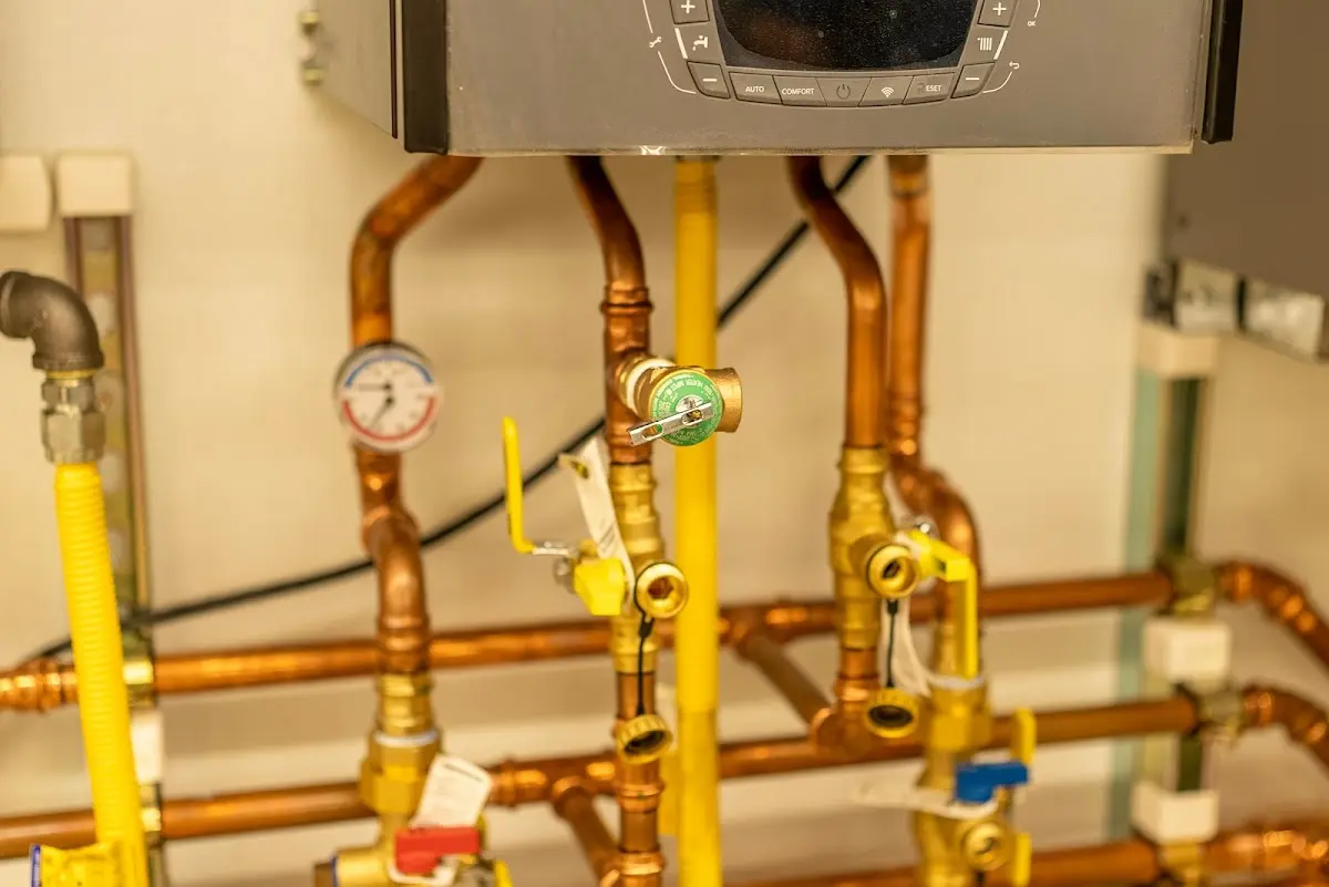 Licensed technician providing Water Heater Installation for a homeowner in Minot AFB